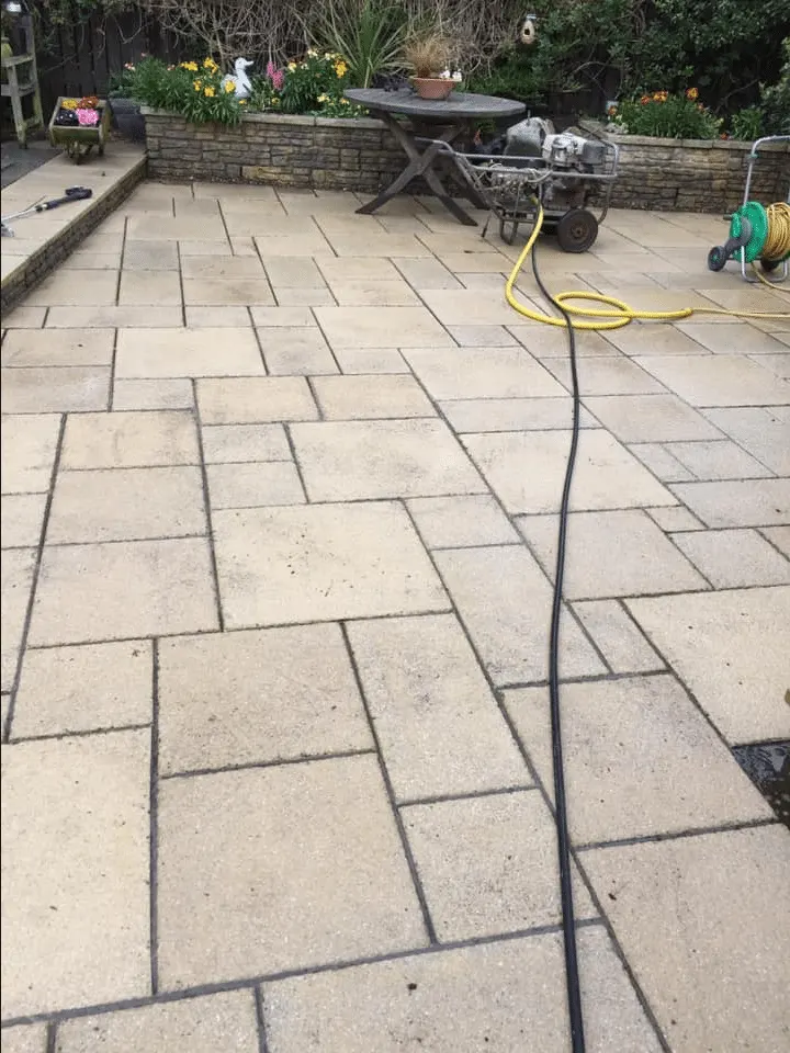 Patio slabs restored to their original colour after pressure cleaning